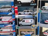 a lot of different models of ambulances on display