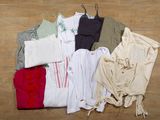 a lot of clothes that are on the floor together