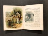 an open book with a picture of a man and a dog