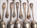 a lot of spoons and spoon spoons on the table