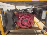 a small engine that is sitting on a cart