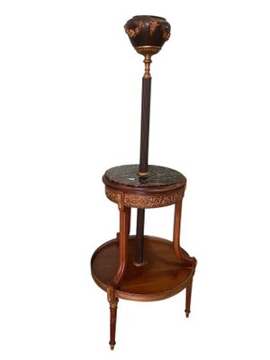 an image of a table with a lamp on top of it