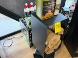 a box of chips on top of a shelf in a store