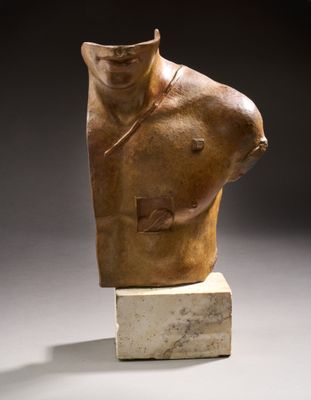 sculpture of a man ' s torso on a marble block