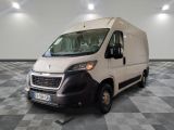 a picture of a white van parked in a room