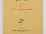 a yellow book with red writing on the cover