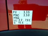a sticker on the back of a car that has a price tag attached to it