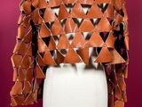 an orange leather jacket on a mannequin mannequin mannequin mannequin mannequin mannequin mannequin mannequin manne