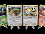 four pokemon cards are lined up in a row on a black background