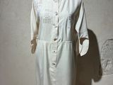 an image of a mannequin with a white dress on it
