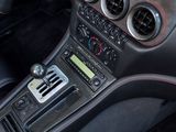 the dashboard of a car with a digital clock on the dash