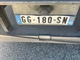 a close up of a license plate on the back of a truck