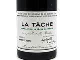 a bottle of wine that is sitting on a table