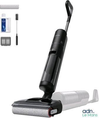 an image of a black and white vacuum cleaner with a cleaning kit