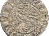 une pièce d'argent sur laquelle est représenté un lion