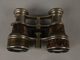 a pair of binoculars that are on a table