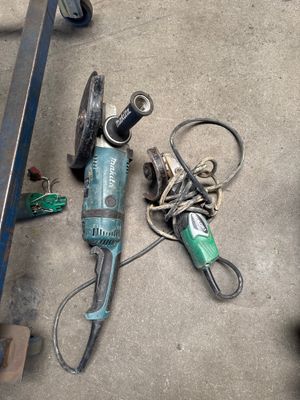 an image of a drill and other tools on the floor