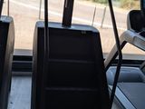 two treadmills in the room with a view of the street