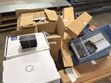 boxes and boxes of electronic equipment in a warehouse