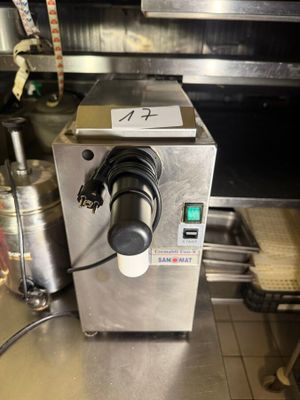 a machine that is sitting on a counter in a kitchen