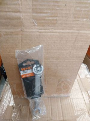 a cardboard box that has a couple of tools inside of it