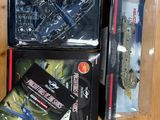 a box of assorted toys sitting on a table