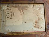 a picture of an old book on a wooden table