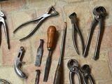 many different types of tools that are on the floor