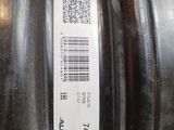 a close up of a tire with a barcode on it