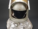 an image of a silver helmet on a black background