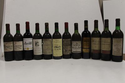 many bottles of wine lined up on the counter
