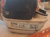 a picture of a pair of chainsaws sitting on a table