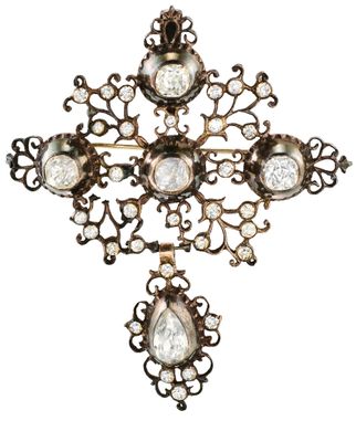 une image représentant une croix en verre et en métal