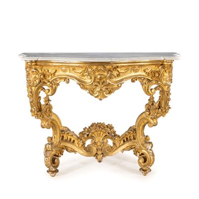 une table console en or avec un plateau en marbre