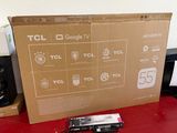 a box that is sitting on a table with a remote