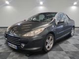 grey car in a room with checkered floor and lights