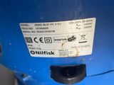 a close up of a blue container with a label on it