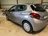 a silver car that is parked in a garage