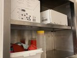 a metal shelf with a bunch of items on it