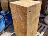 a large wooden box sitting on a pallet in the middle of a yard