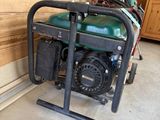 a small generator that is sitting in the garage