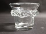 a glass cup with a handle on a table