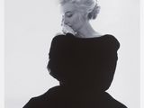 an image of a black and white photo of a woman in a dress