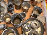 a box full of old metal items sitting on a table