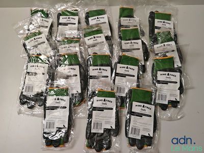 a lot of bags of green and black gloves on a table