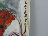 a painting of a red fire hydrant on a white wall