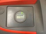 a close up of a car dashboard with a clock on it