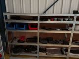 a garage with a lot of tools on the shelves