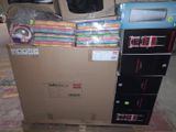 a cardboard box with a bunch of items on top of it
