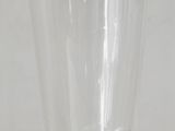 a clear glass that is sitting on a table